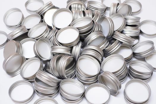 Bottle silver cap on a white background.