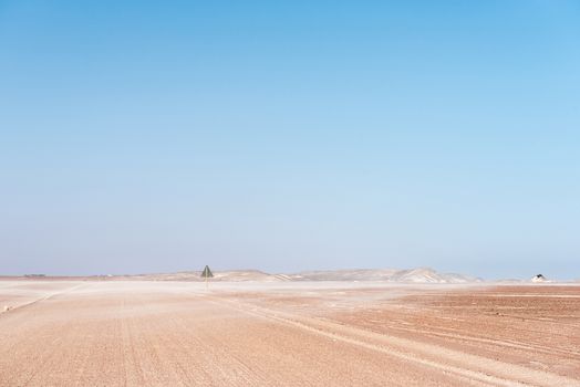 Sand blowing accross the C34-road between Henties Bay and Torra Bay in the Skeleton Coast area of Namibia