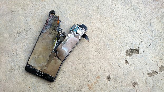 Totally broken mobile phone.