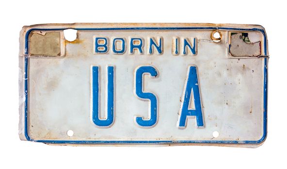 Isolated Grungy Patriotic License Plate With Born In USA