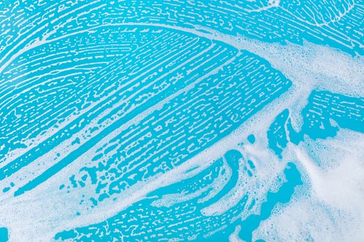 abstract background, soap foam on a blue background