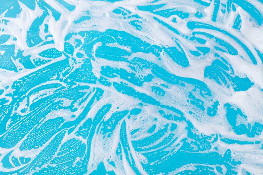 abstract background, soap foam on a blue background