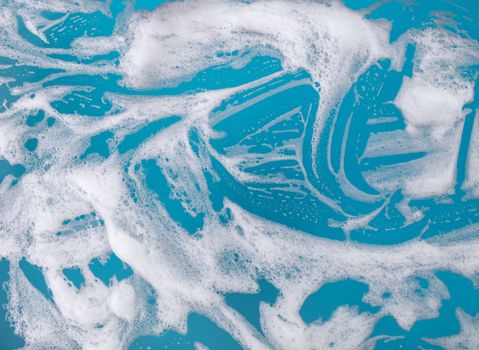 abstract background, soap foam on a blue background