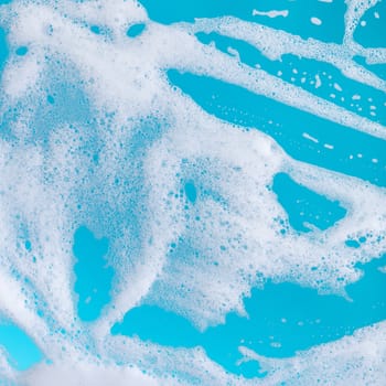 abstract background, soap foam on a blue background