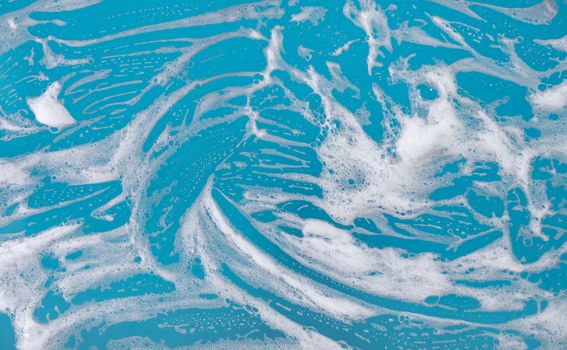 abstract background, soap foam on a blue background