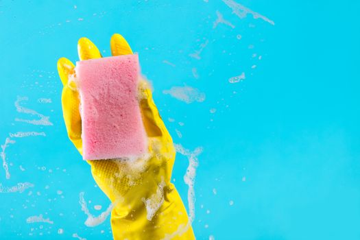 Cleaning concept, hand with a rag cleans the surface
