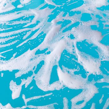 abstract background, soap foam on a blue background