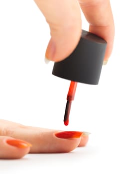 hand care, nail painting with red lacquer