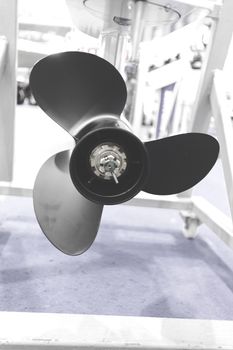 the part of the propeller of a speedboath , note shallow depth of field