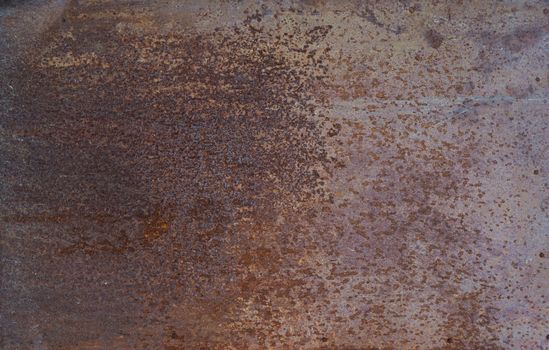 Brown background: metal surface with mint paint and creased texture