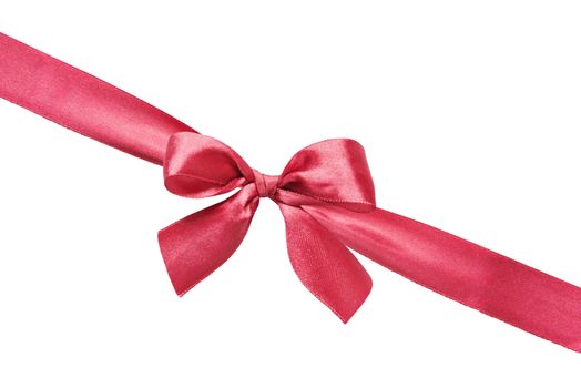 Red silk gift bow on the diagonally red silk ribbon isolated on a white background