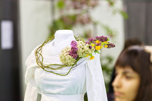 traditional costum with decoration of flowers, note shallow depth of field