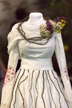 traditional costum with decoration of flowers, note shallow depth of field