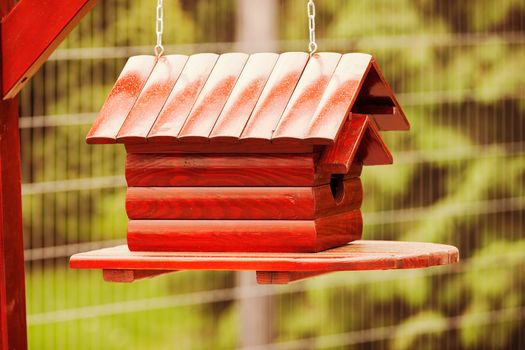 handmade wooden birdhouses, note shallow depth of field