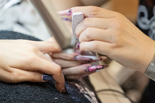 manicure artificial nails, note shallow depth of field