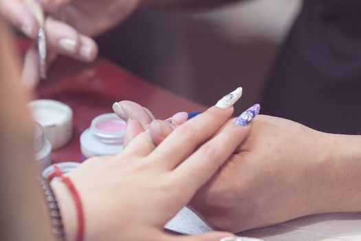 manicure artificial nails, note shallow depth of field