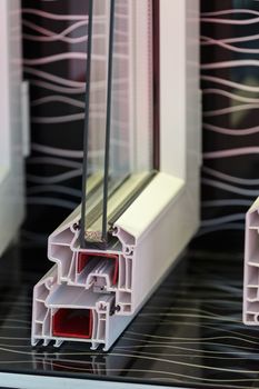 cross-section aluminum window frames on a colorful background , note shallow depth of field