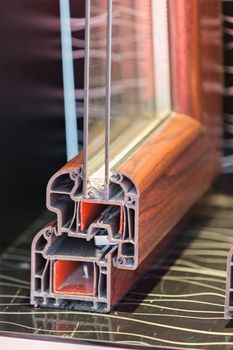 cross-section aluminum window frames on a colorful background , note shallow depth of field