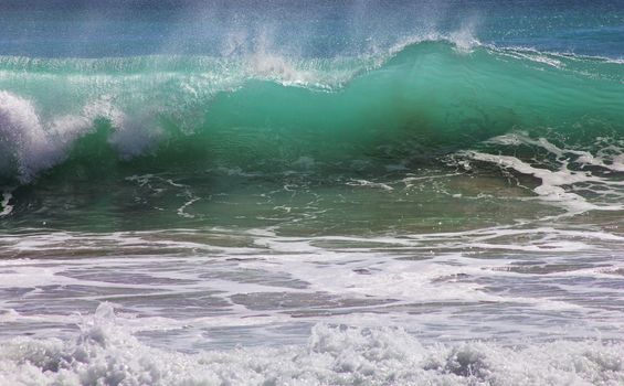 Big wave crashes on to the shore. Indian ocean