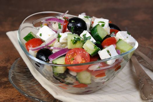 greek salad orzo pasta with black olive, red onion and cucumber, cherry tomatoes, feta and herbs