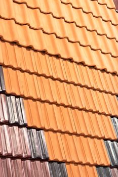 types of red tiles for roof  to cover the house, note shallow depth of field