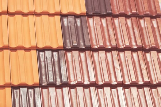 types of red tiles for roof  to cover the house, note shallow depth of field