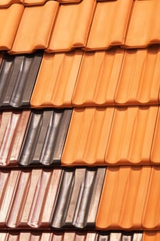 types of red tiles for roof  to cover the house, note shallow depth of field