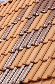 types of red tiles for roof  to cover the house, note shallow depth of field