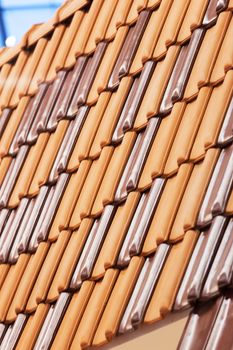 types of red tiles for roof  to cover the house, note shallow depth of field