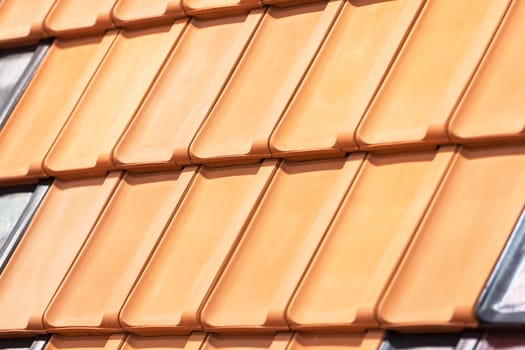 types of red tiles for roof  to cover the house, note shallow depth of field