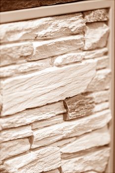 a part of new stone wall, note shallow depth of field