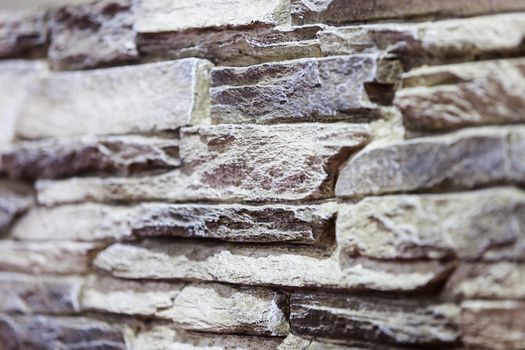 a part of new stone wall, note shallow depth of field