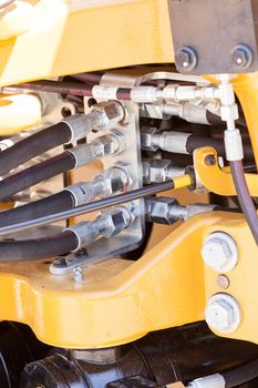 parts of machinery for the construction industry, note shallow depth of field