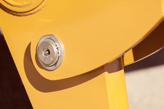 parts of machinery for the construction industry, note shallow depth of field