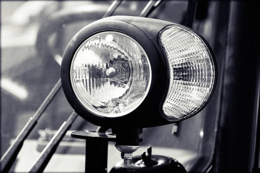 type headlights of the machine, note shallow depth of field