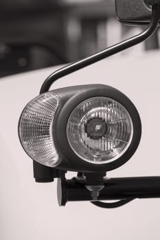 type headlights of the machine, note shallow depth of field