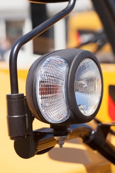 type headlights of the machine, note shallow depth of field