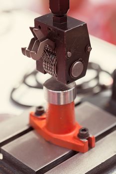 detail of metal processing machines , note shallow depth of field