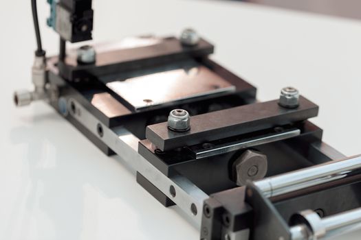 detail of metal processing machines , note shallow depth of field