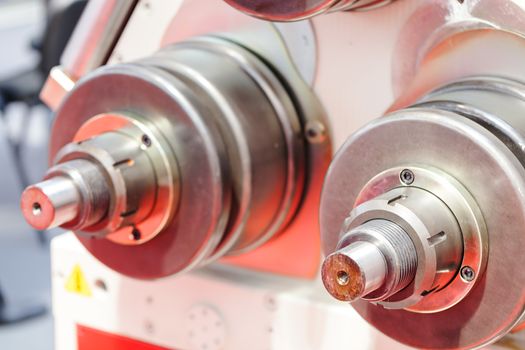 part of metal processing machines , note shallow depth of field