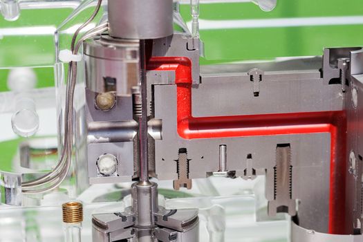 detail of metal processing machines on the blue background, note shallow depth of field