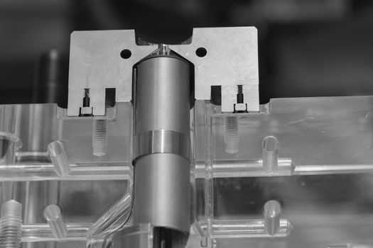 detail of metal processing machines on the blue background, note shallow depth of field