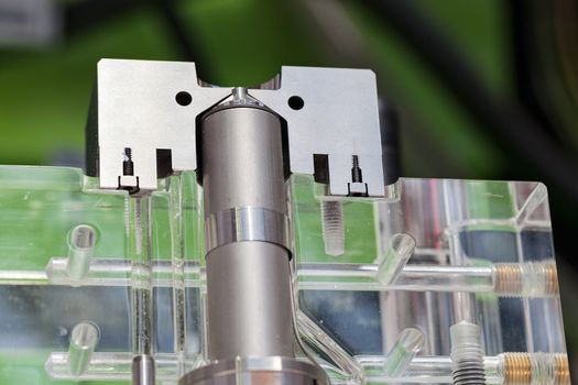 detail of metal processing machines on the blue background, note shallow depth of field