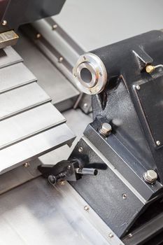 part of metal processing machines, note shallow depth of field