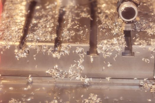 Metal shavings  after processing of object, note shallow depth of field