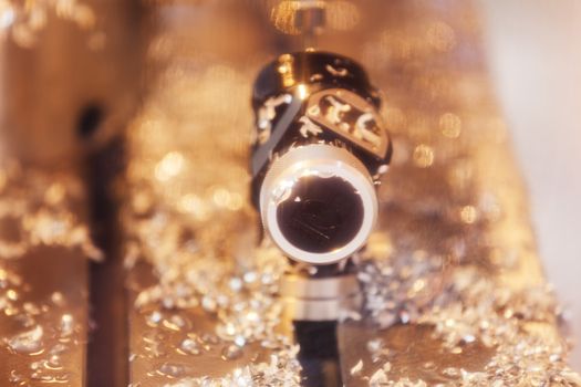 Metal shavings  after processing of object, note shallow depth of field