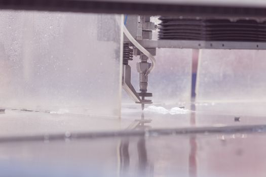 cnc water jet machine for  metalworking, note shallow depth of field