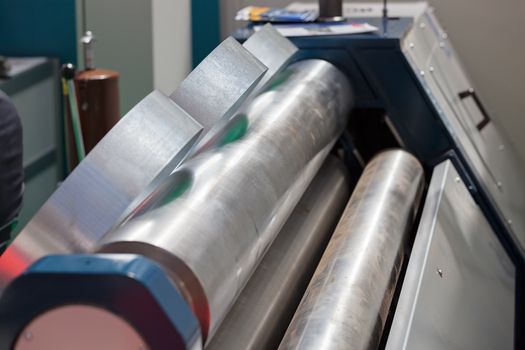 detail of hydraulic press for metalworking, note shallow depth of field