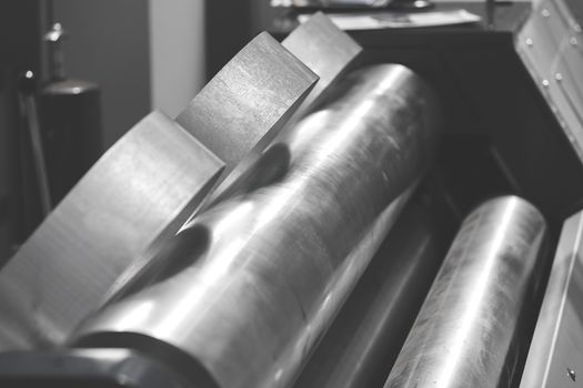 detail of hydraulic press for metalworking, note shallow depth of field