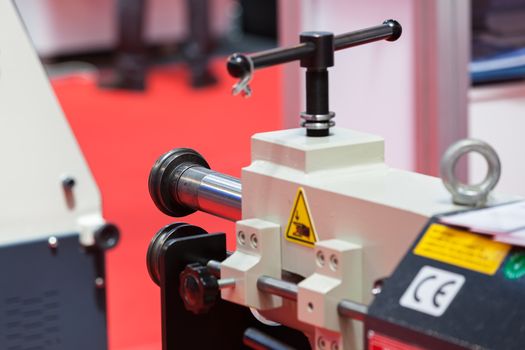 hydraulic press for metalworking, note shallow depth of field